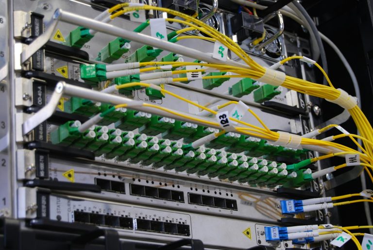 Universal Service Fund – fibre optic cables connected to a network switch