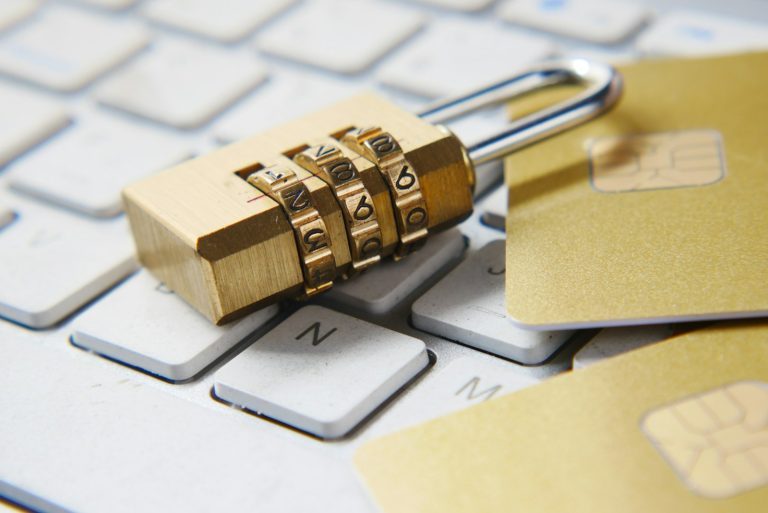 Cyber fraud in Pakistan – a padlock on a laptop keyboard