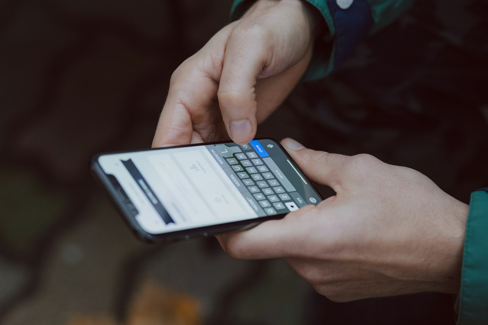 eSIM fee in Pakistan – a person using a smartphone