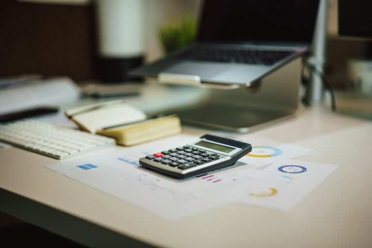 Income tax return deadline 2026 – calculator and laptop on a desk